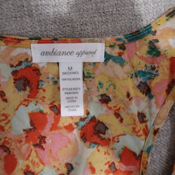 Floral Sleeveless Top with Long Back Hem - Picture 7 of 7